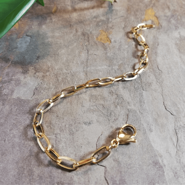 rvs grove schakelarmband goud